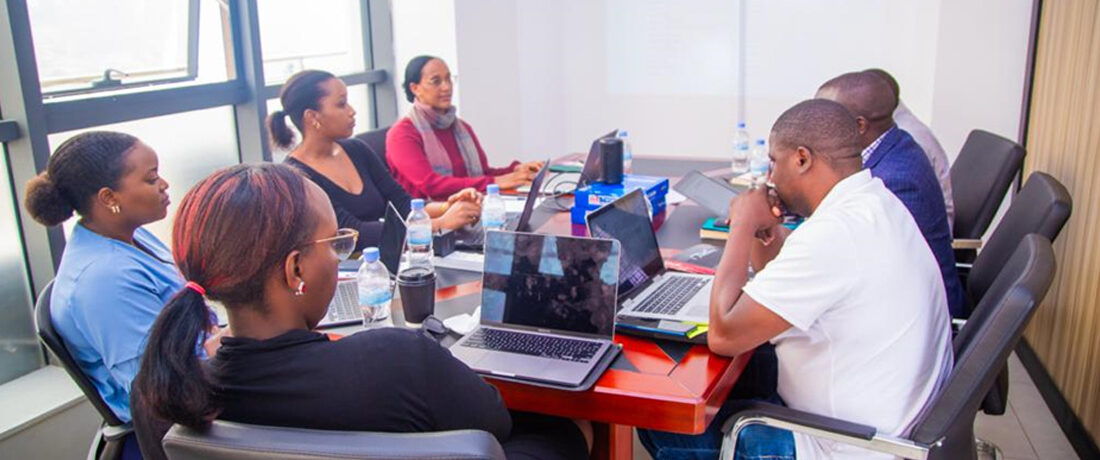 staff members meeting in a conference room